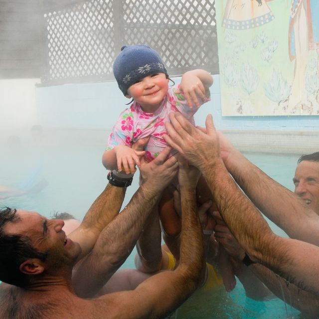 family enjoying a hot spring