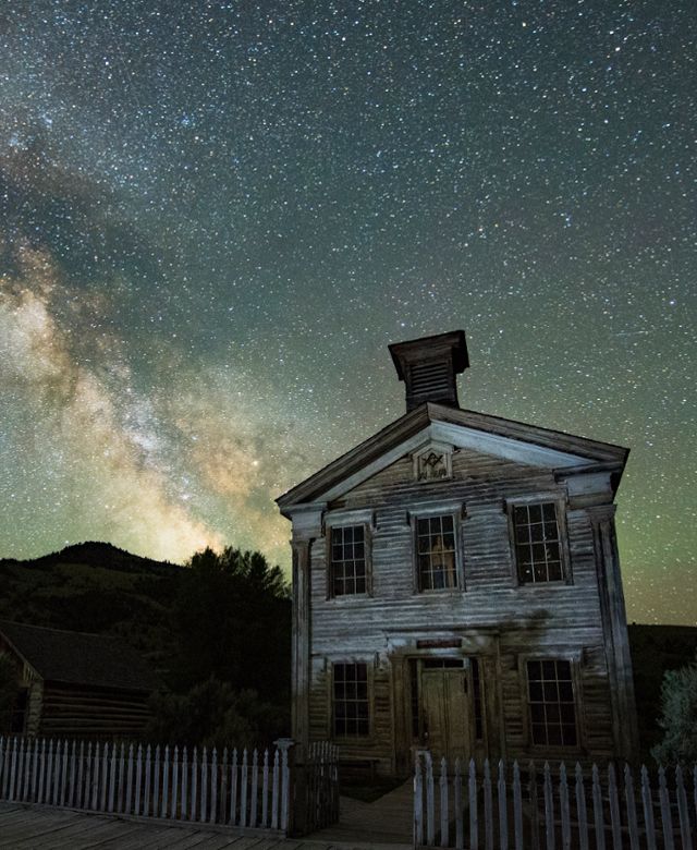 Bannack State Park at night against the brilliant stars of the Milky Way