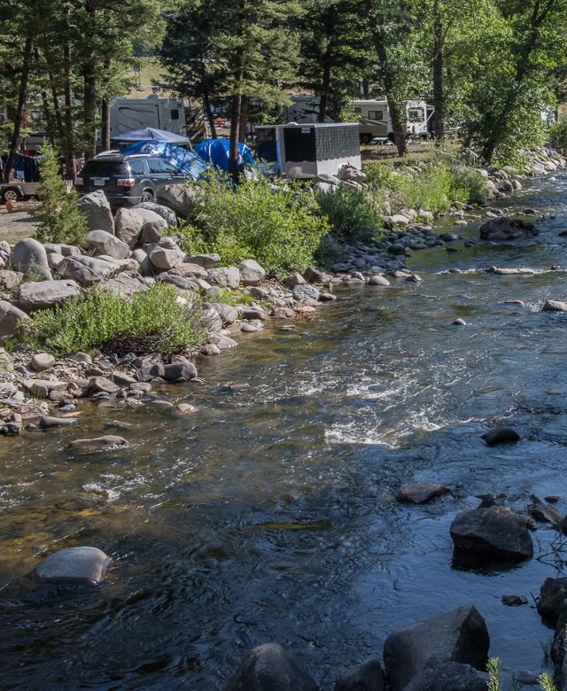 Tents and campers along Basin Creek