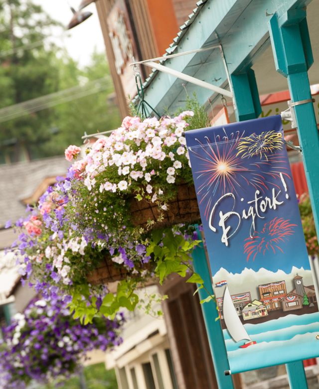 colorful flowers in hanging baskets along Electric Avenue in Bigfork