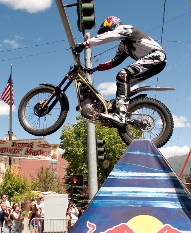 Motorcyclist trick riding in Butte