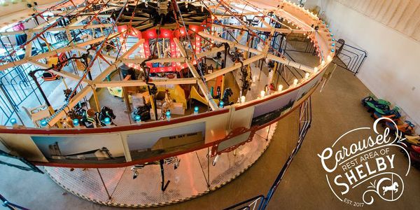 a high view looking down on a vintage carousel