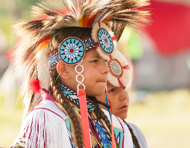 Native child in regalia