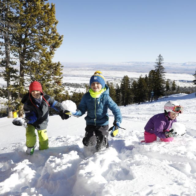 Kids playing in snow at Red Lodge Mountain