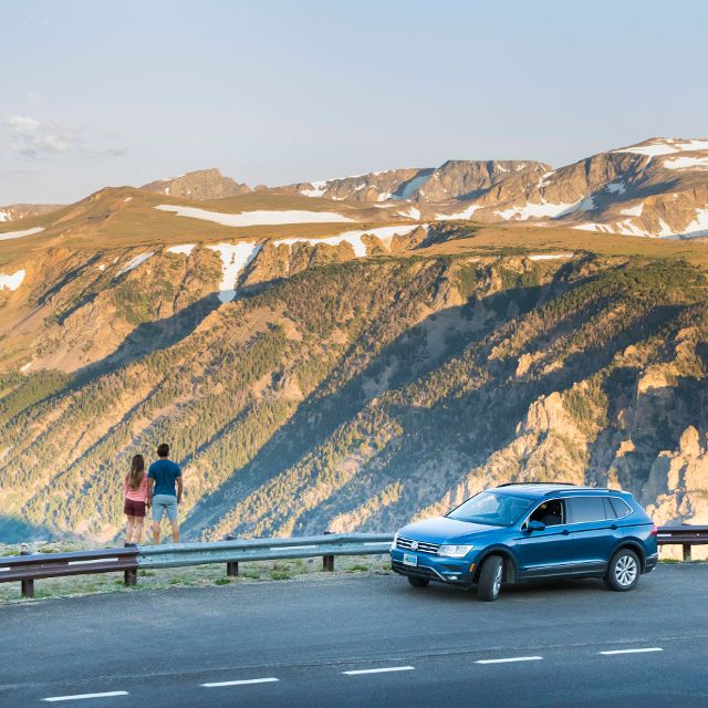 couple overlooking vista at highway pull out