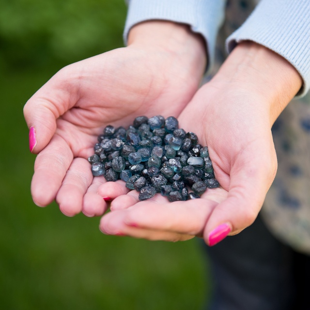 person holding Montana sapphires