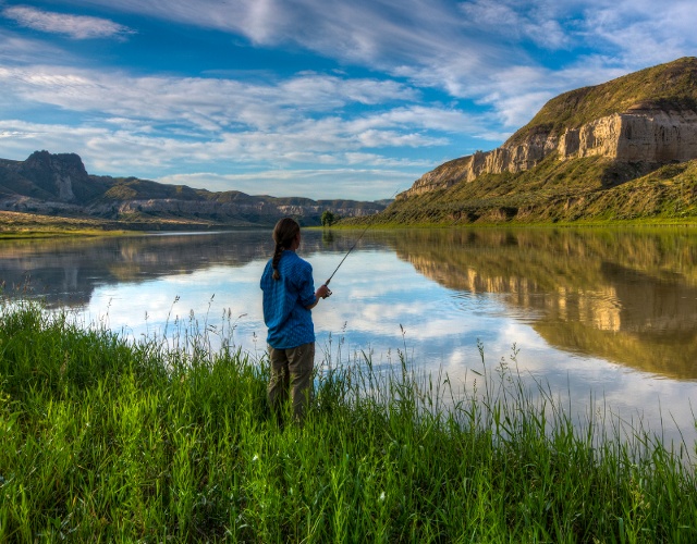 woman fly fishing near Missouri River Breaks