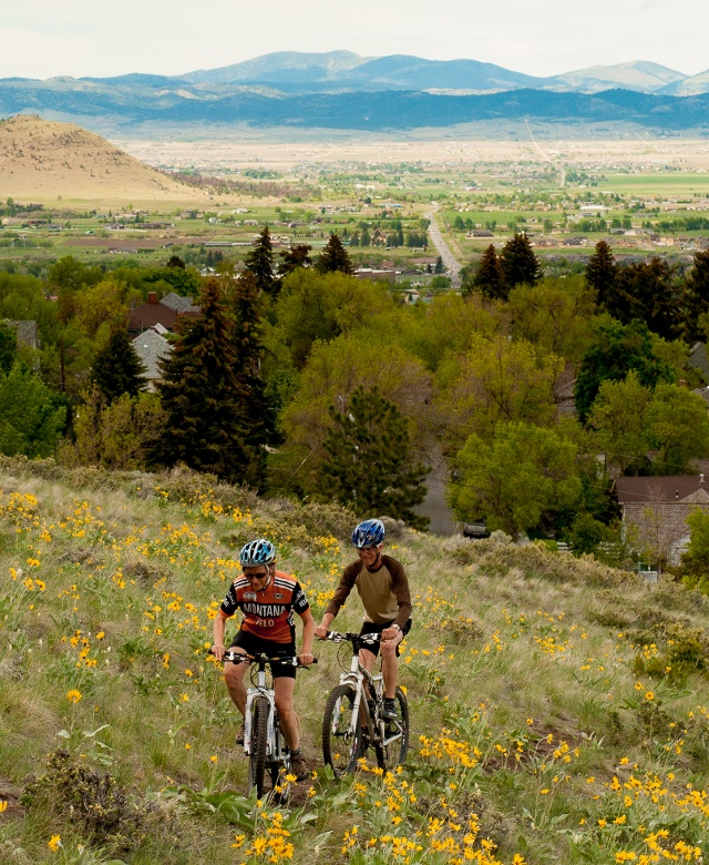 Two people mountain biking, Mount Helena City Park, Helena