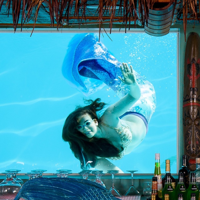 mermaid swimming at Sip 'n Dip Lounge