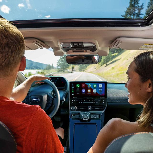 Couple driving in a car