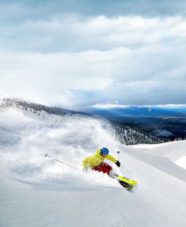 Skier skiing down a mountin.