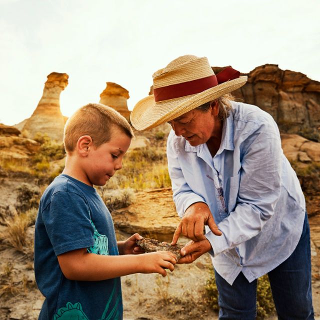 woman guiding a young boy at Makoshika State Park