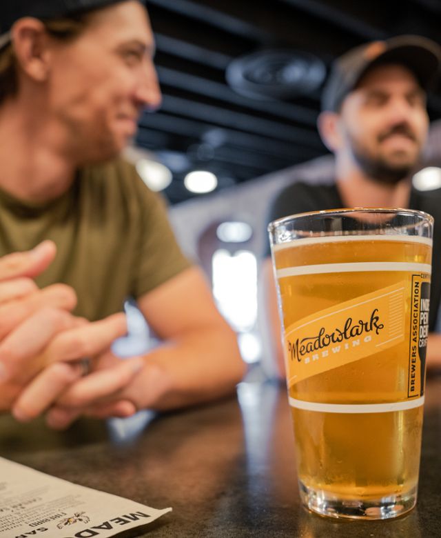 Friends sharing beer