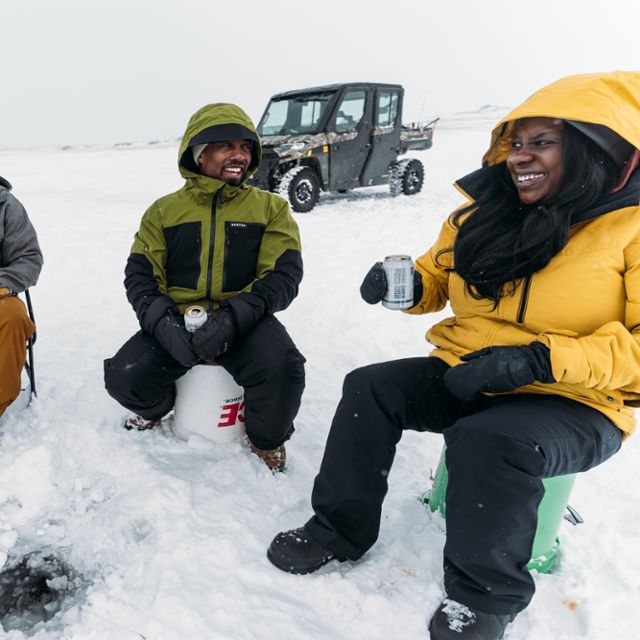 Couple ice fishing